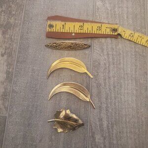 Lot of 4 vintage brooches